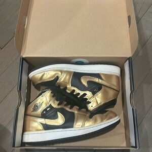 Golden Nike Jordans